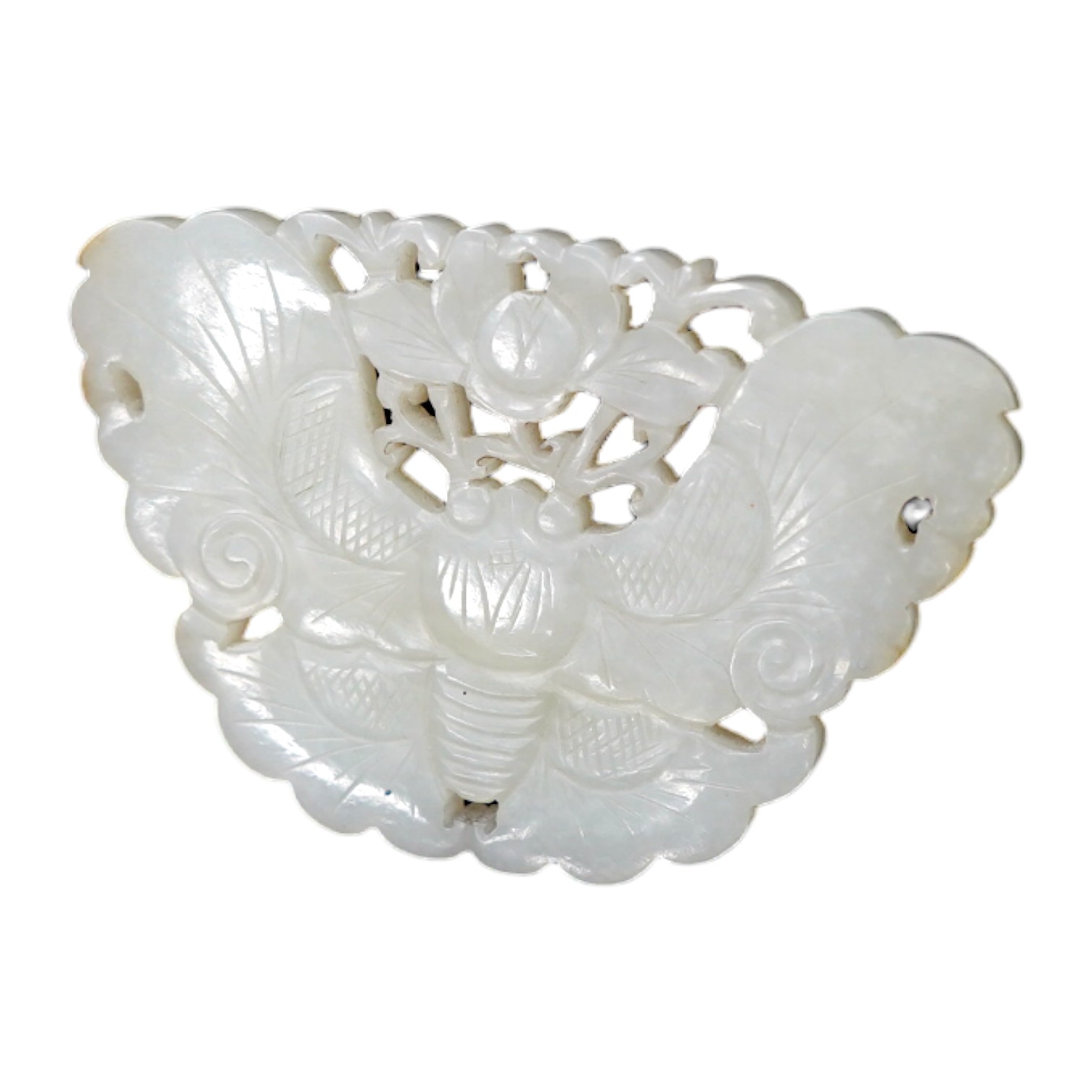 A Chinese reticulated jade ‘butterfly’ plaque , late Qing dynasty, 7cm wide. Condition - good